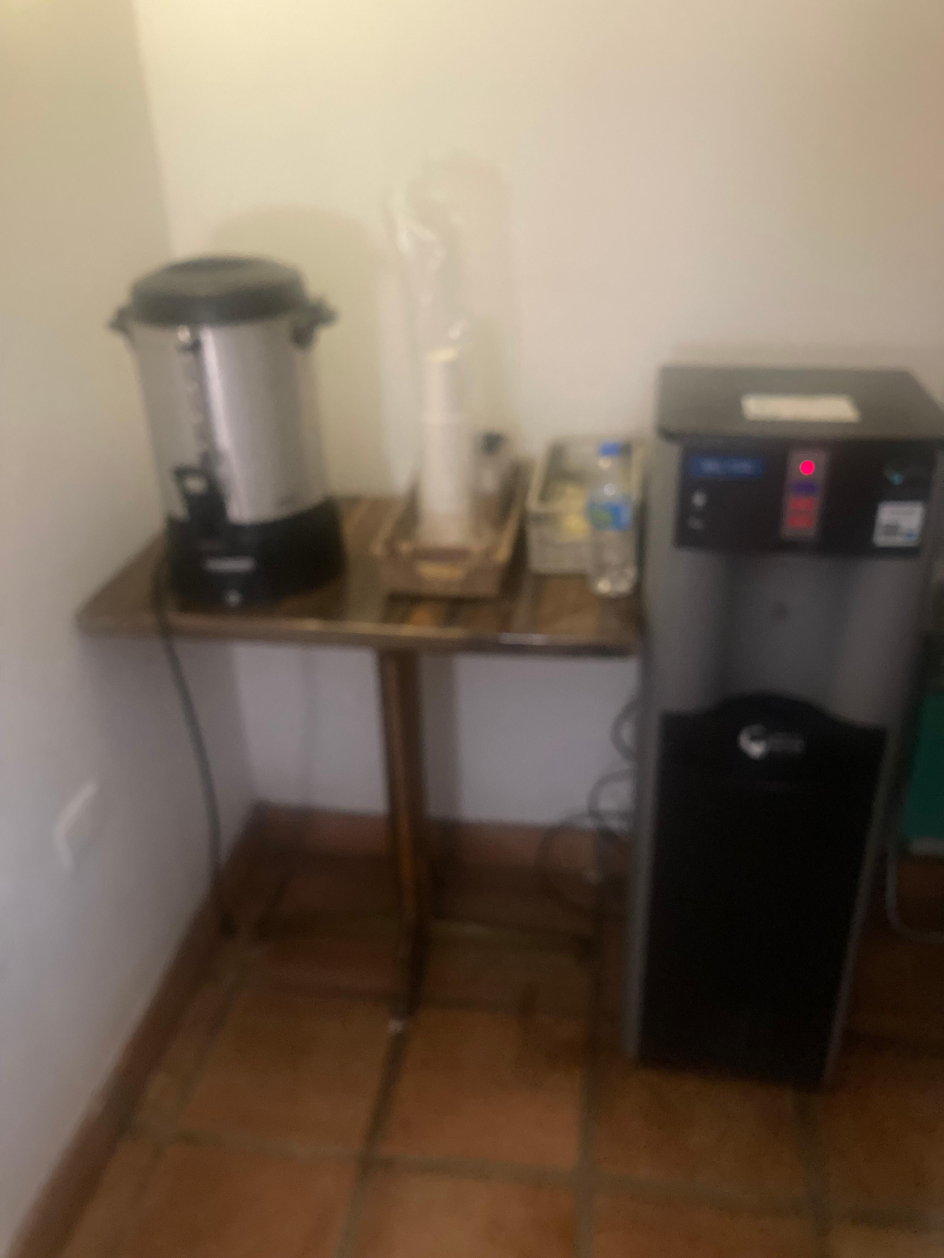 Coffee station notice unplugged and dirty