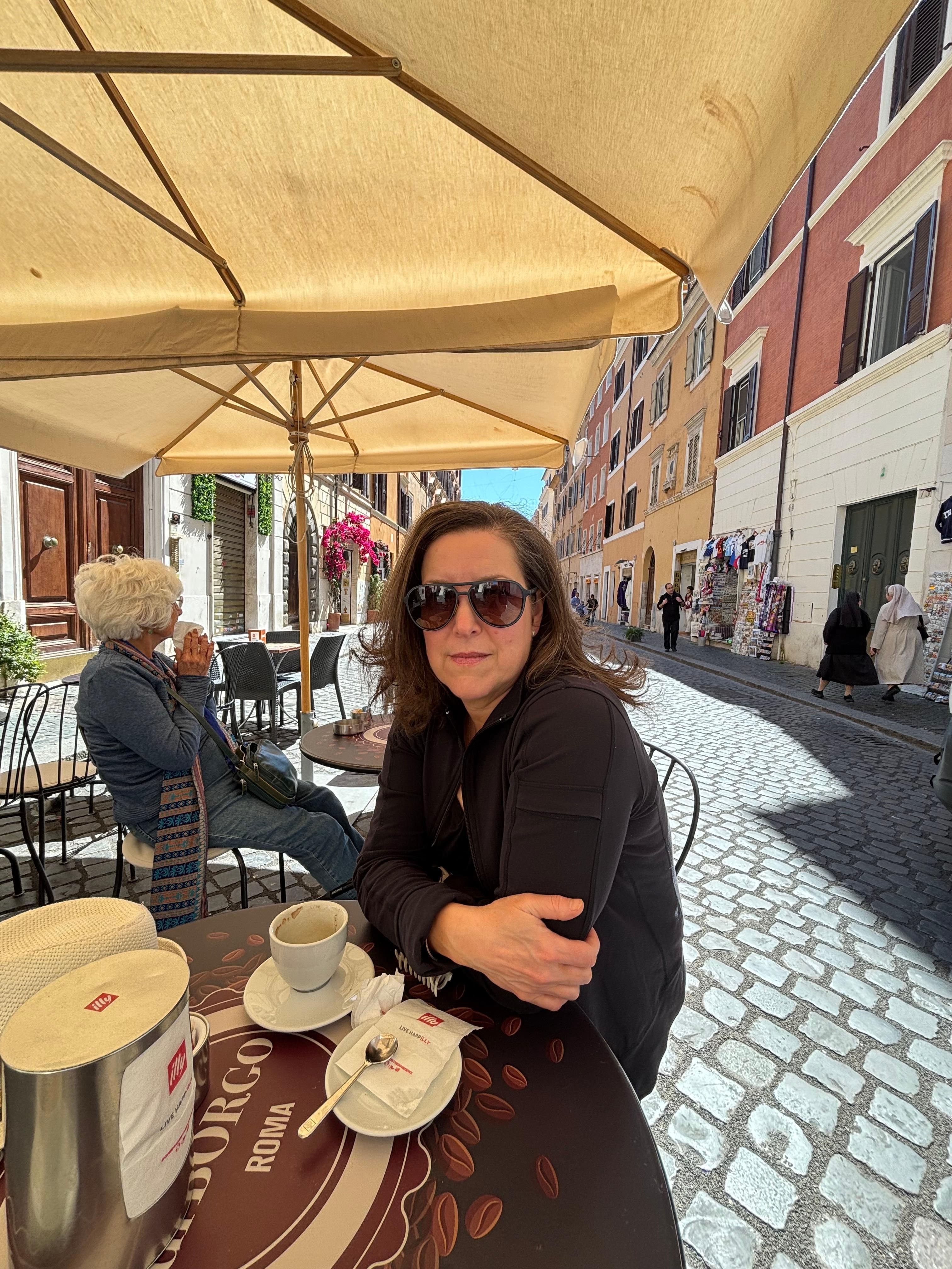 Having a caffe just outside the hotel at a great osteria.