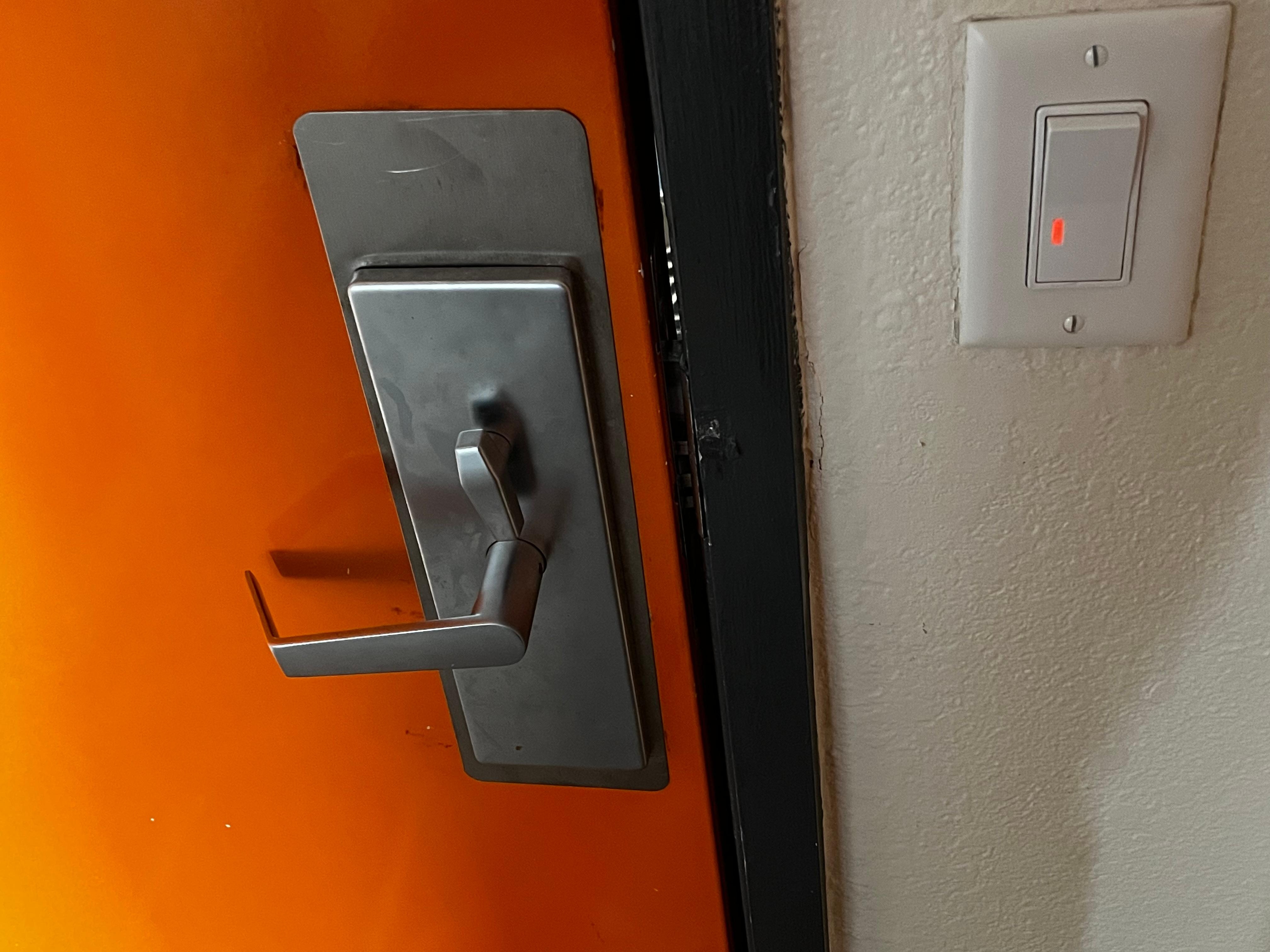 The door appeared to have been broken into before. Could not lock the deadbolt without lifting up on the whole door, and there was a gap 