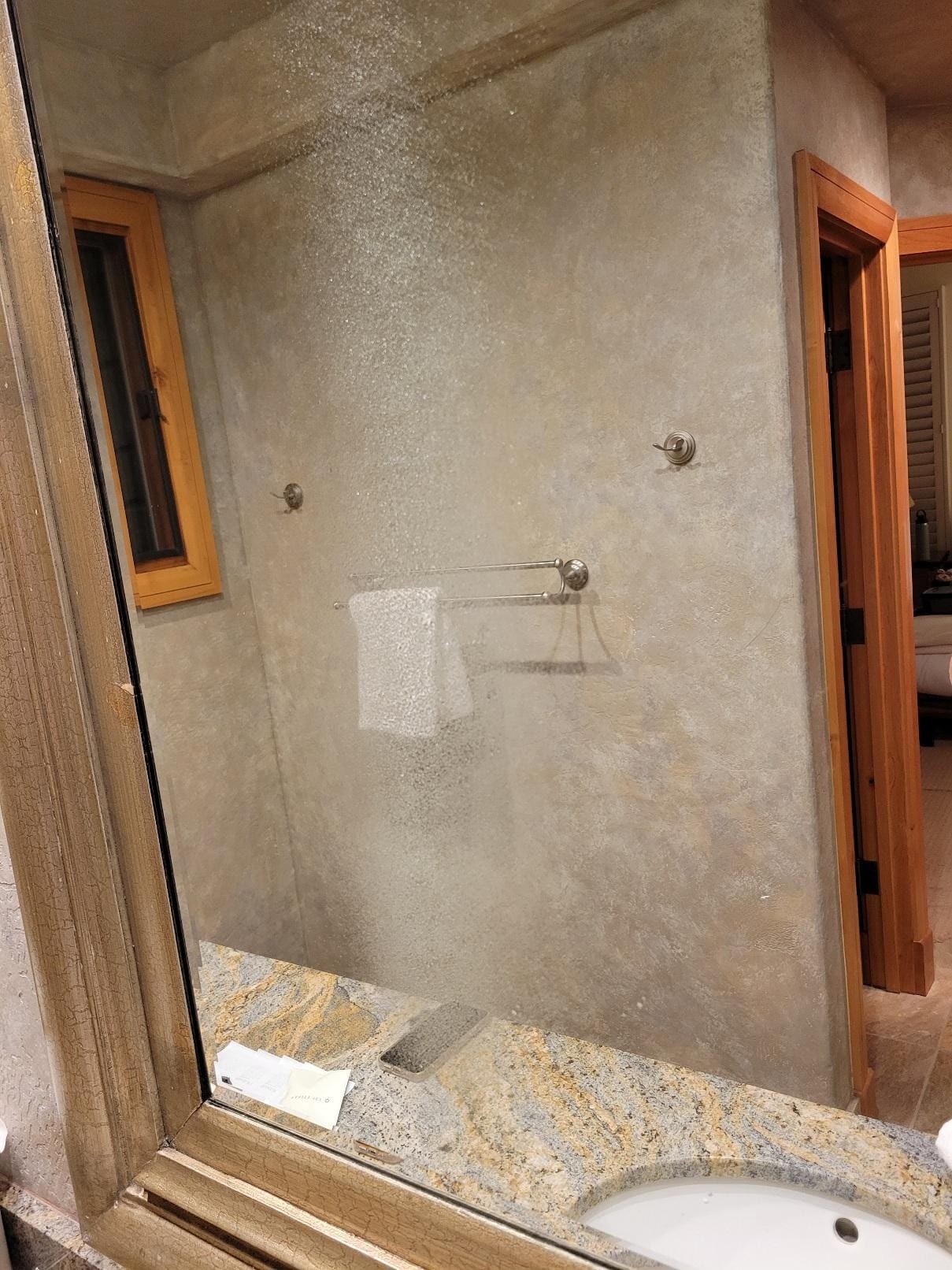 Master bathroom faucet sprayed the mirror.