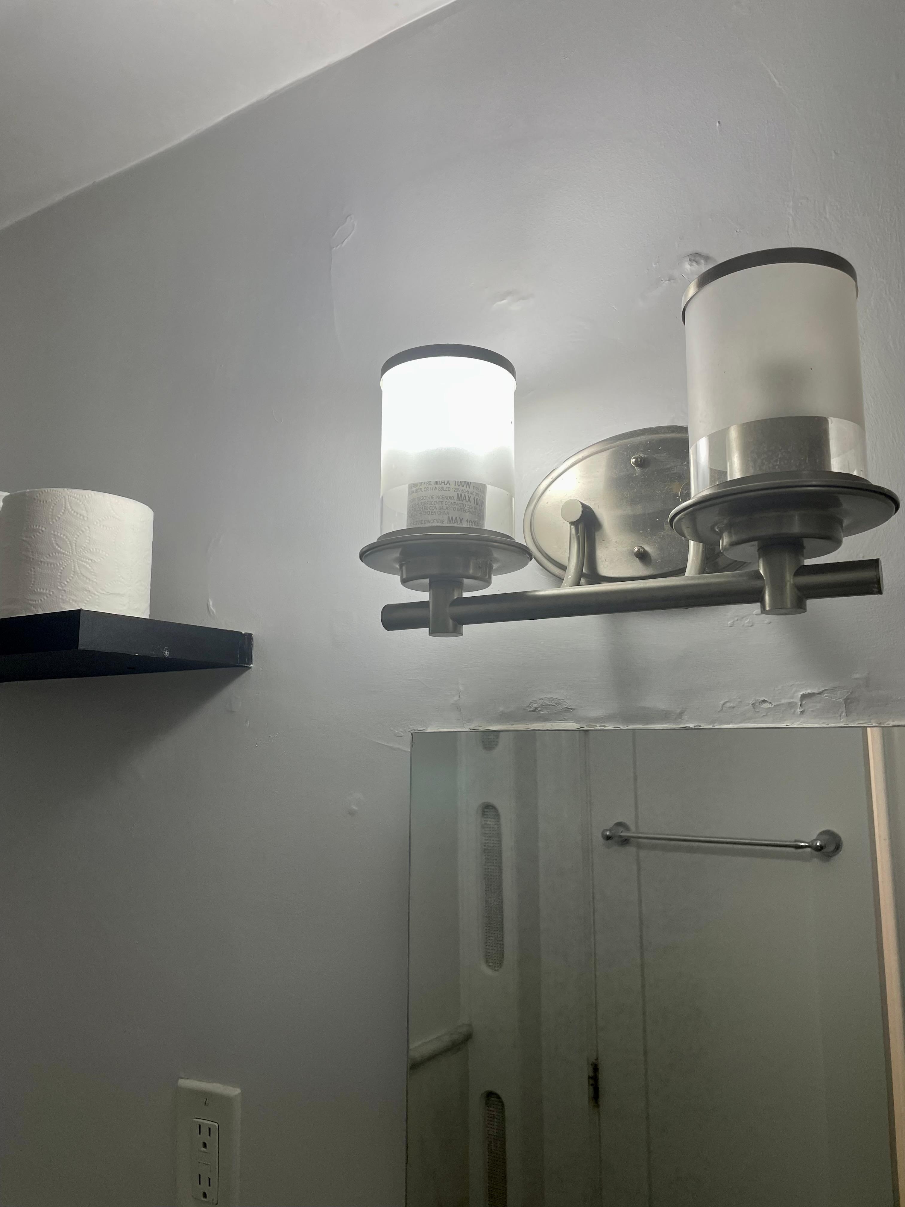 Buckled,Peeling Plaster Bathroom
