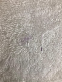 Purple gunk on clean towell