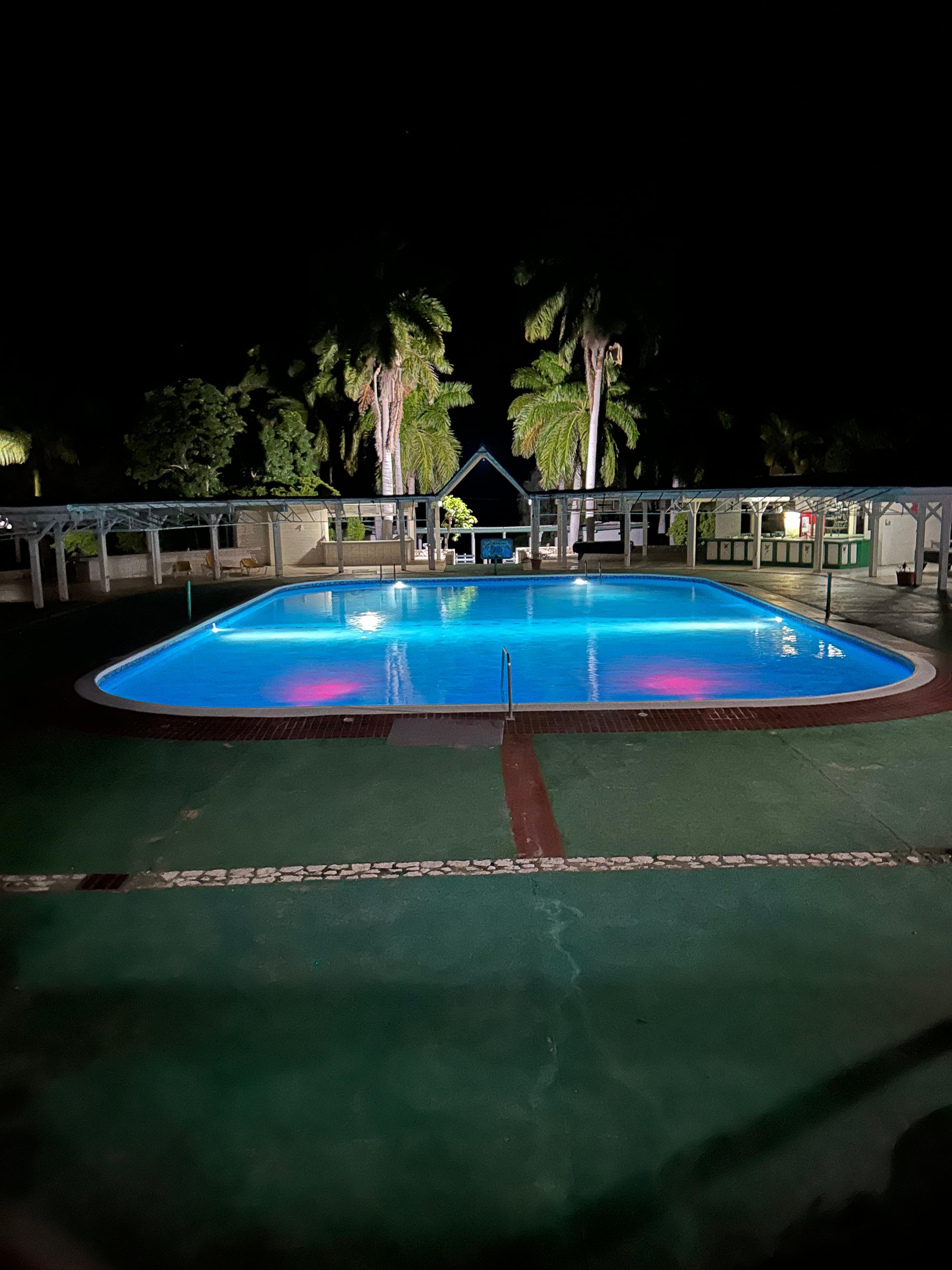 Night time view of the pool