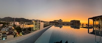 Sunset panoramic from the pool.