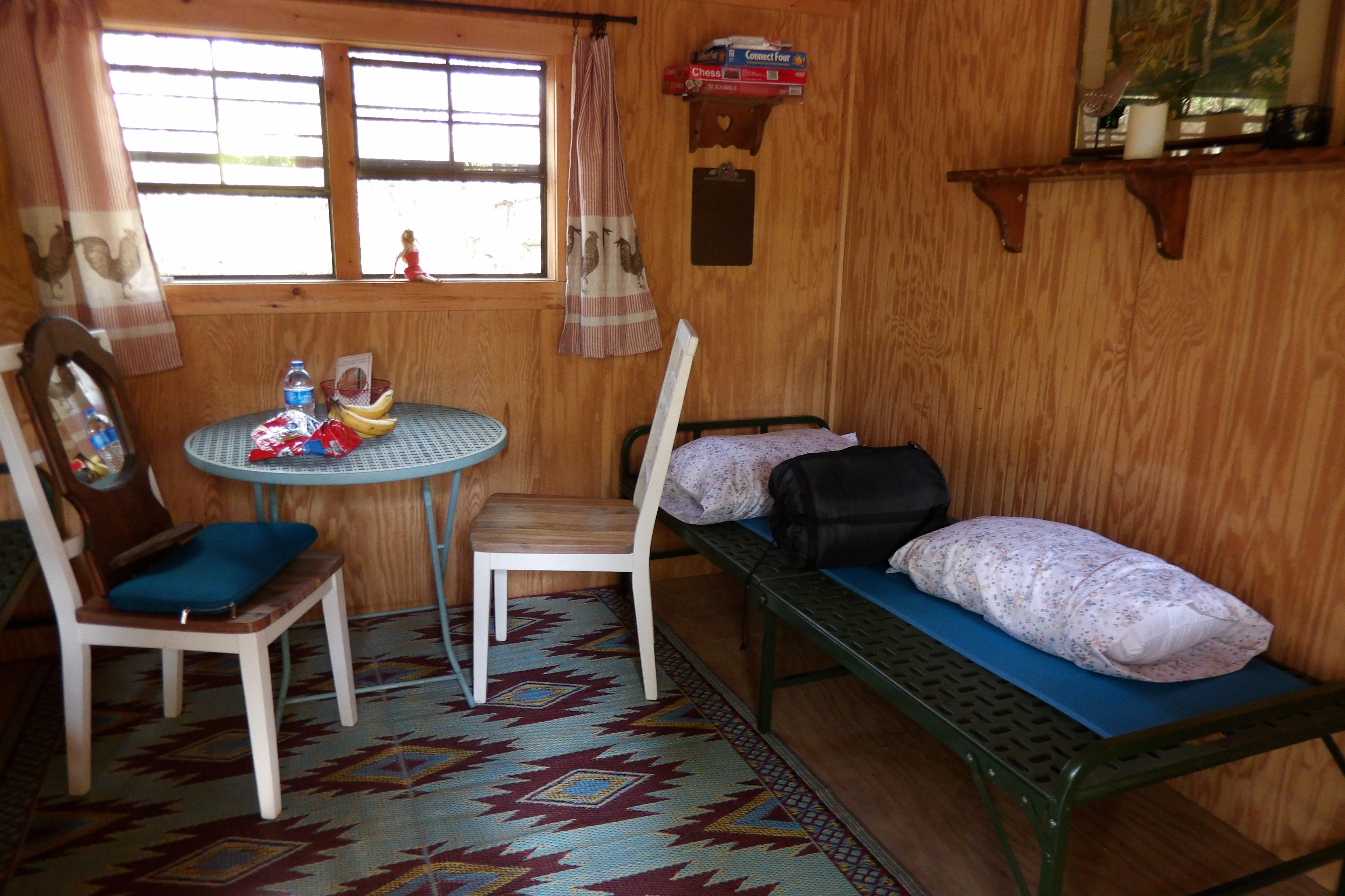 My car camping supplies added to a beautiful cabin