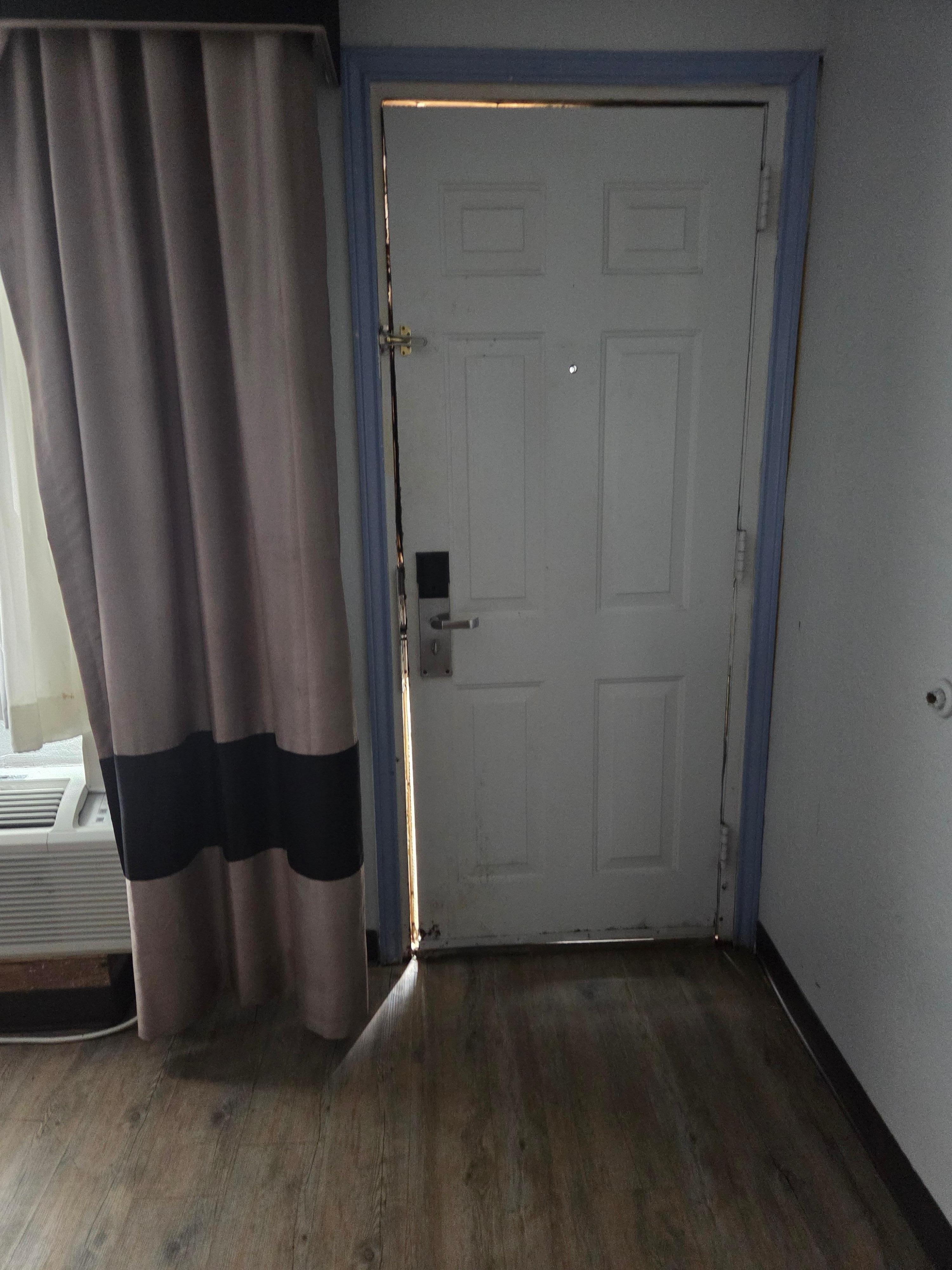 The gap in the door big enough for someone to pry open easily 