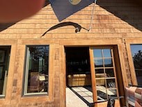 From deck of North lodge looking into living area