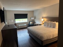 King room, fridge and desk on left