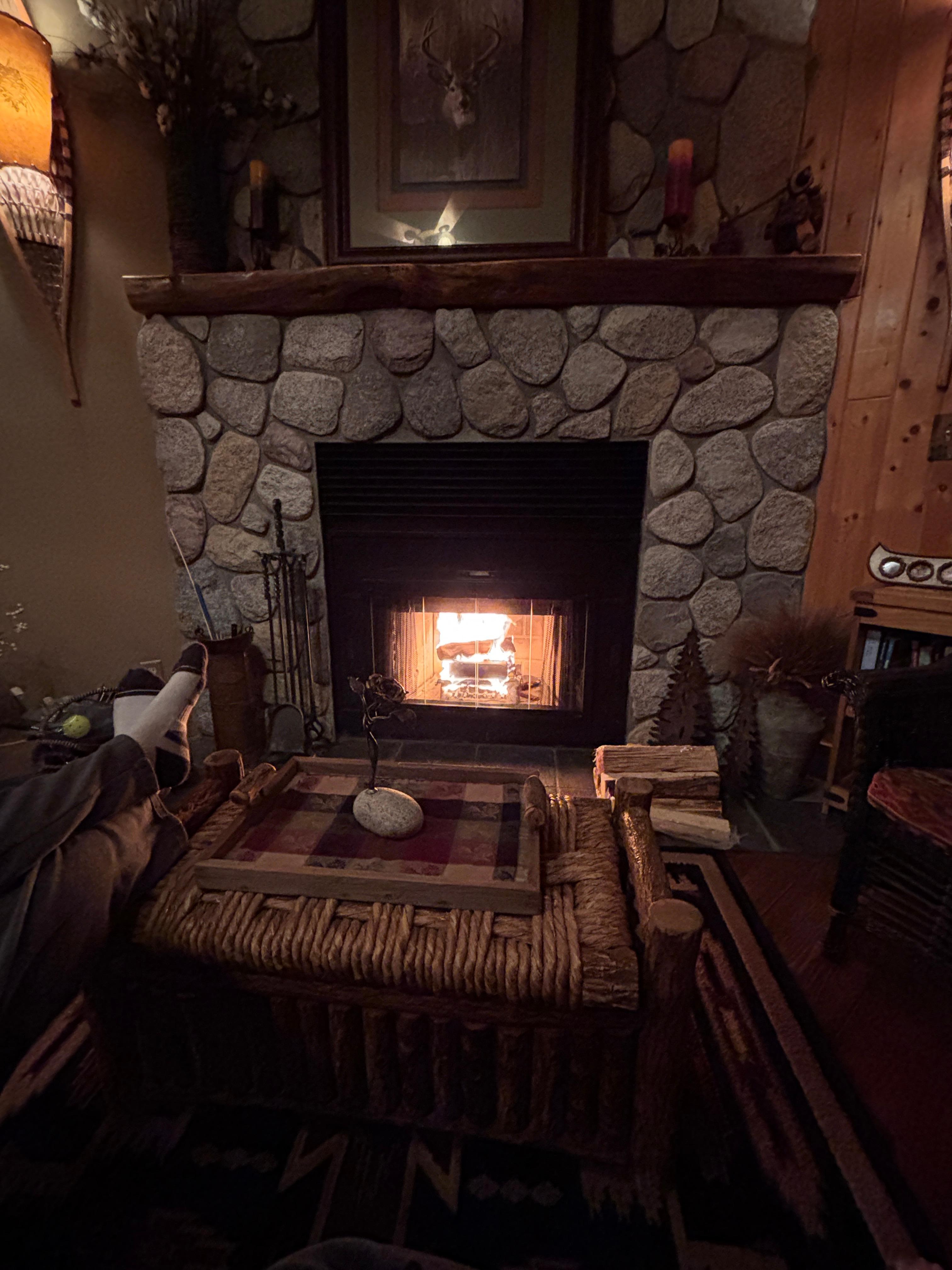 Our first evening — fire crackling, frozen pizza in the oven, and finally a moment to just relax and breathe.