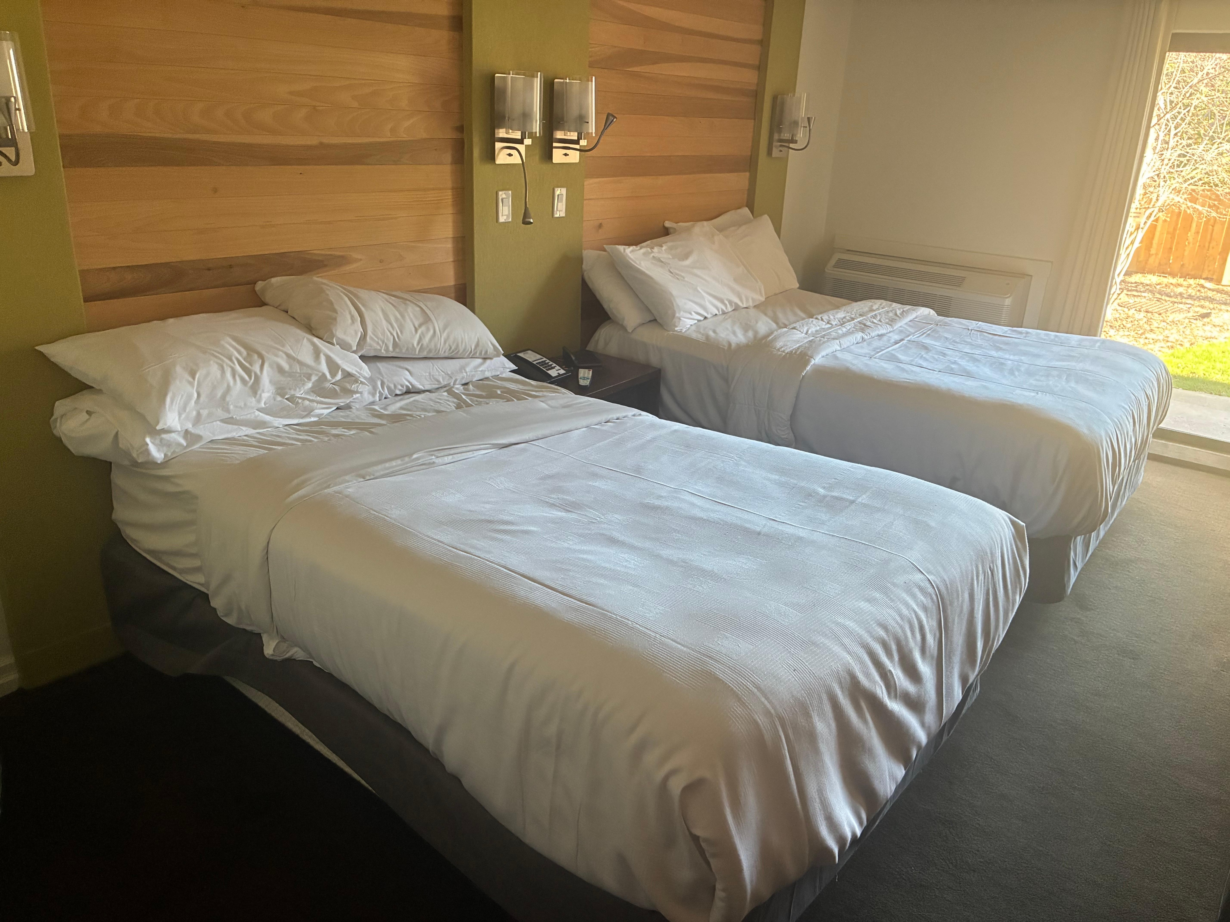 Beds could have been made nicer- sheet was crumpled under duvet. Bed #1 broken by side table- big lean. Only suitable for one person to sleep in, other person would roll off onto the floor