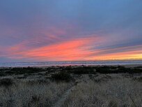 Sunset from the outside deck of the house.