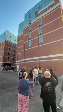 Waiting outside the hotel after a alarm