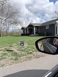 Small yard sign listing units thru 217. The actual unit is 219.