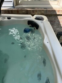 Spa dirty, hair floating. No skimmer even if you wanted to clean it.