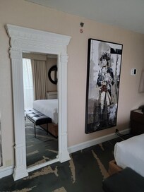 Mirror in bedroom section of suite