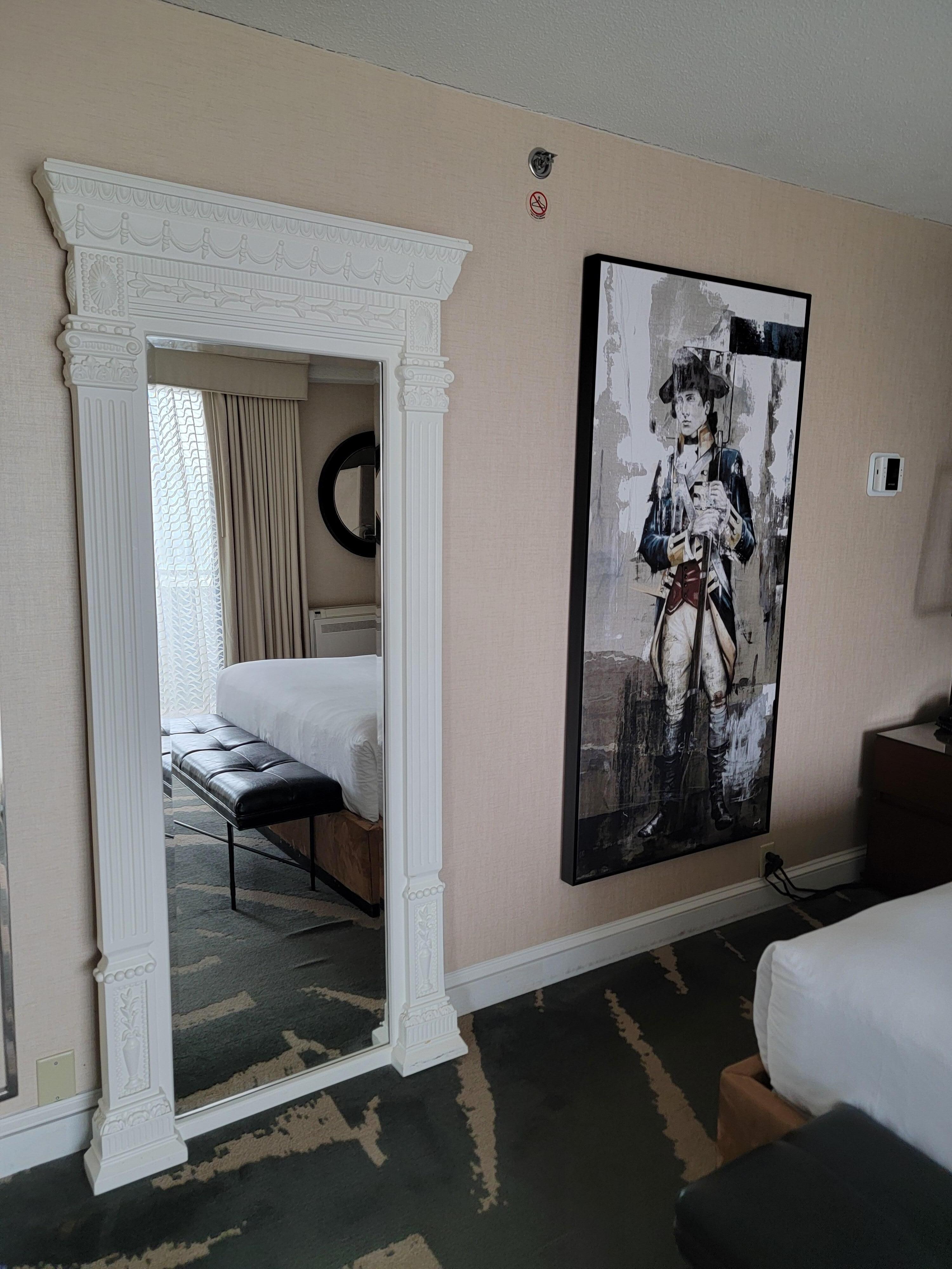 Mirror in bedroom section of suite