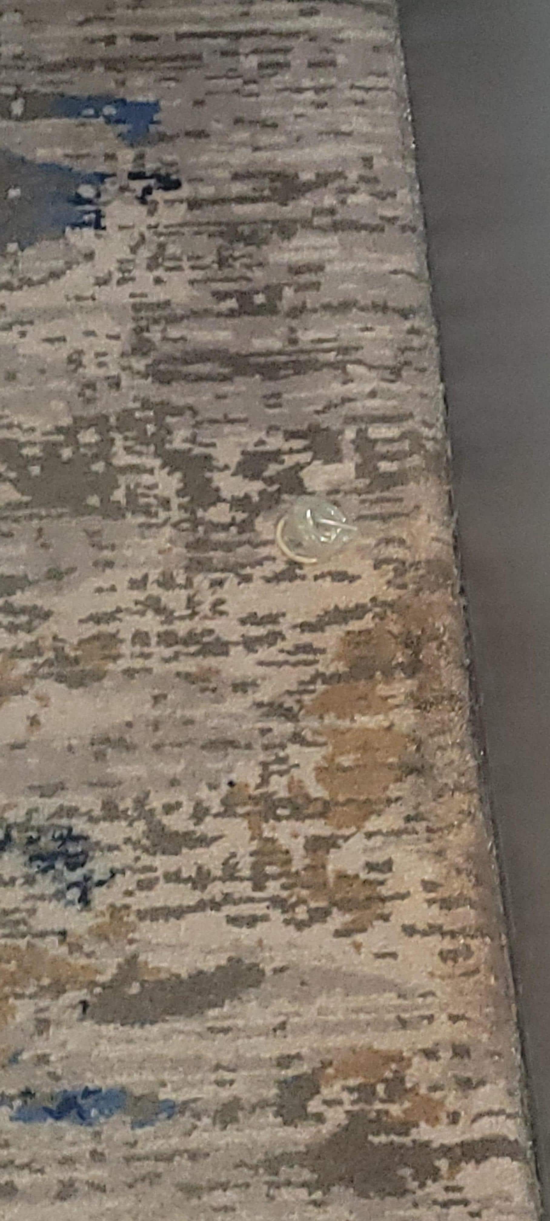 This is the used condom that my 7 year old son found while playing in the floor.