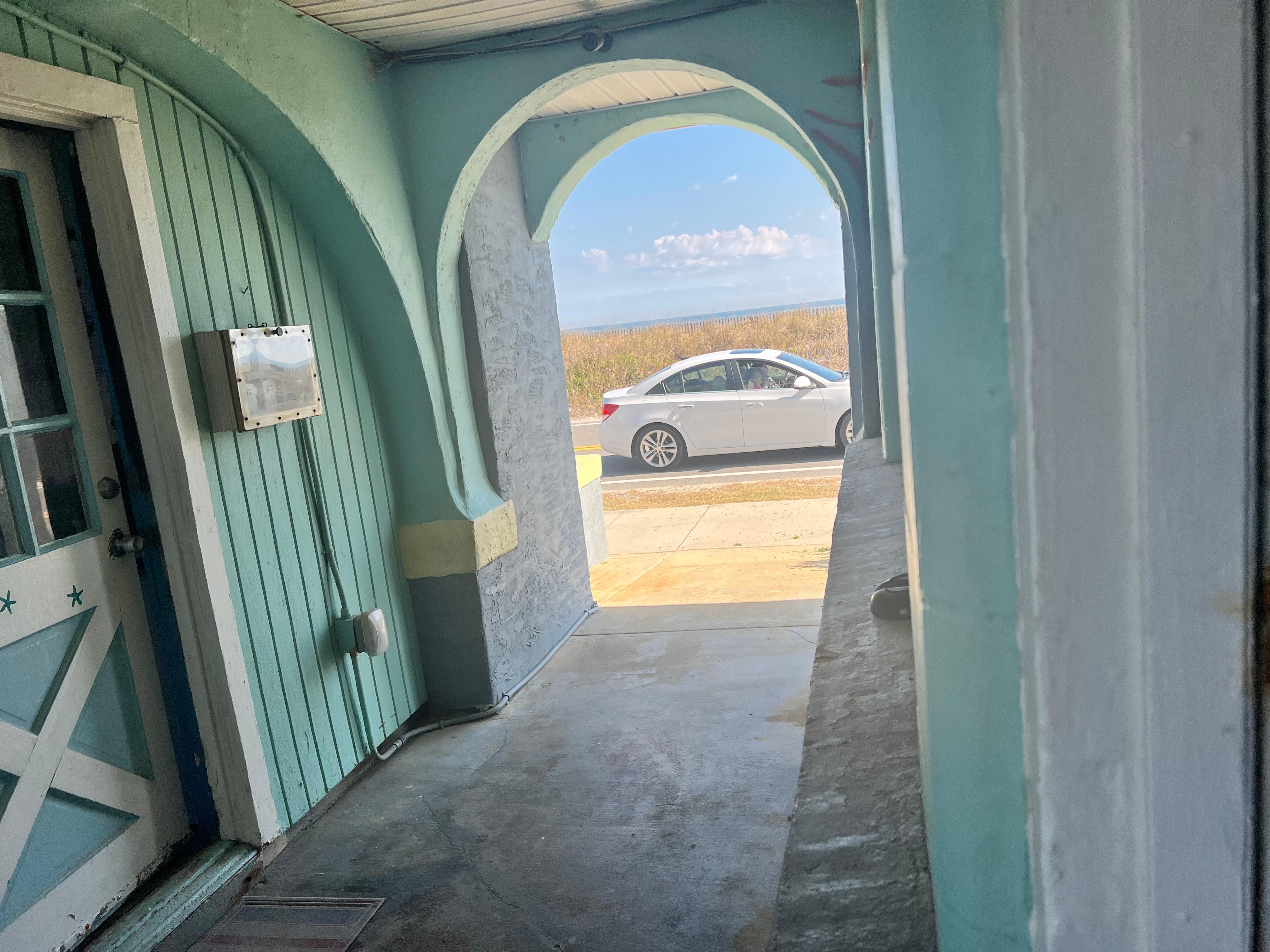 Door to left is office and door to right is Room 1 oceanview 