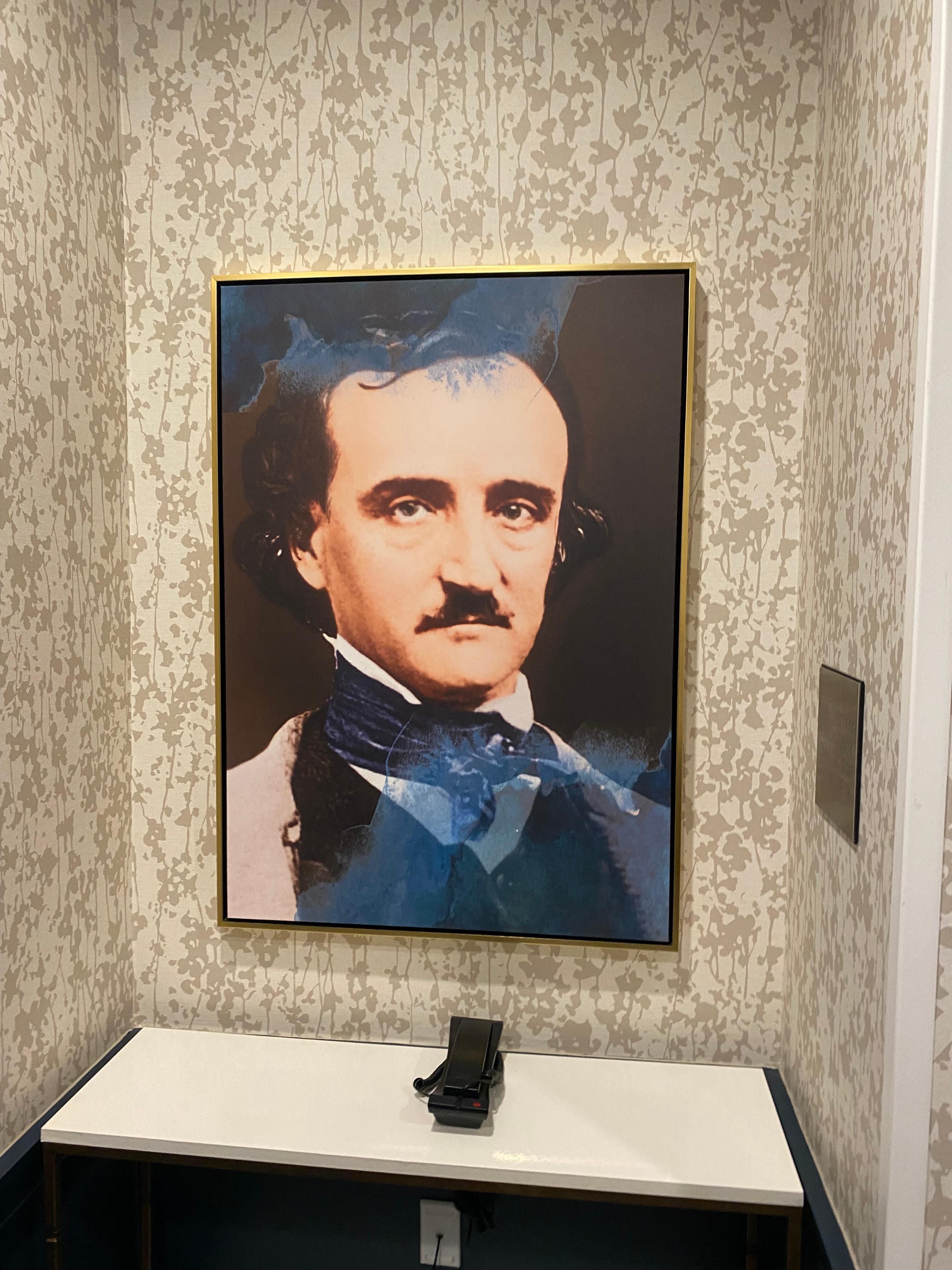 Edgar Allen Poe portrait near the elevator