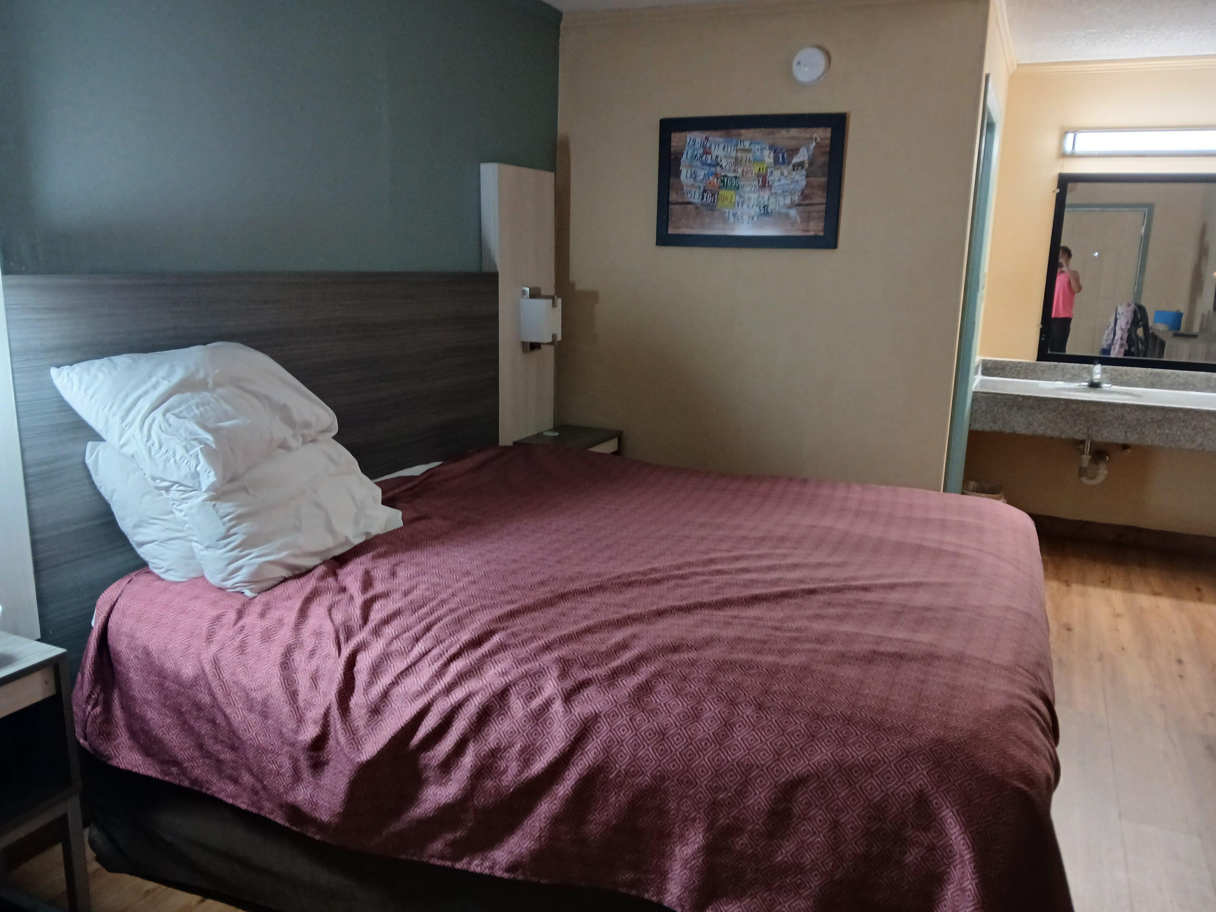 Bed with thin cover.