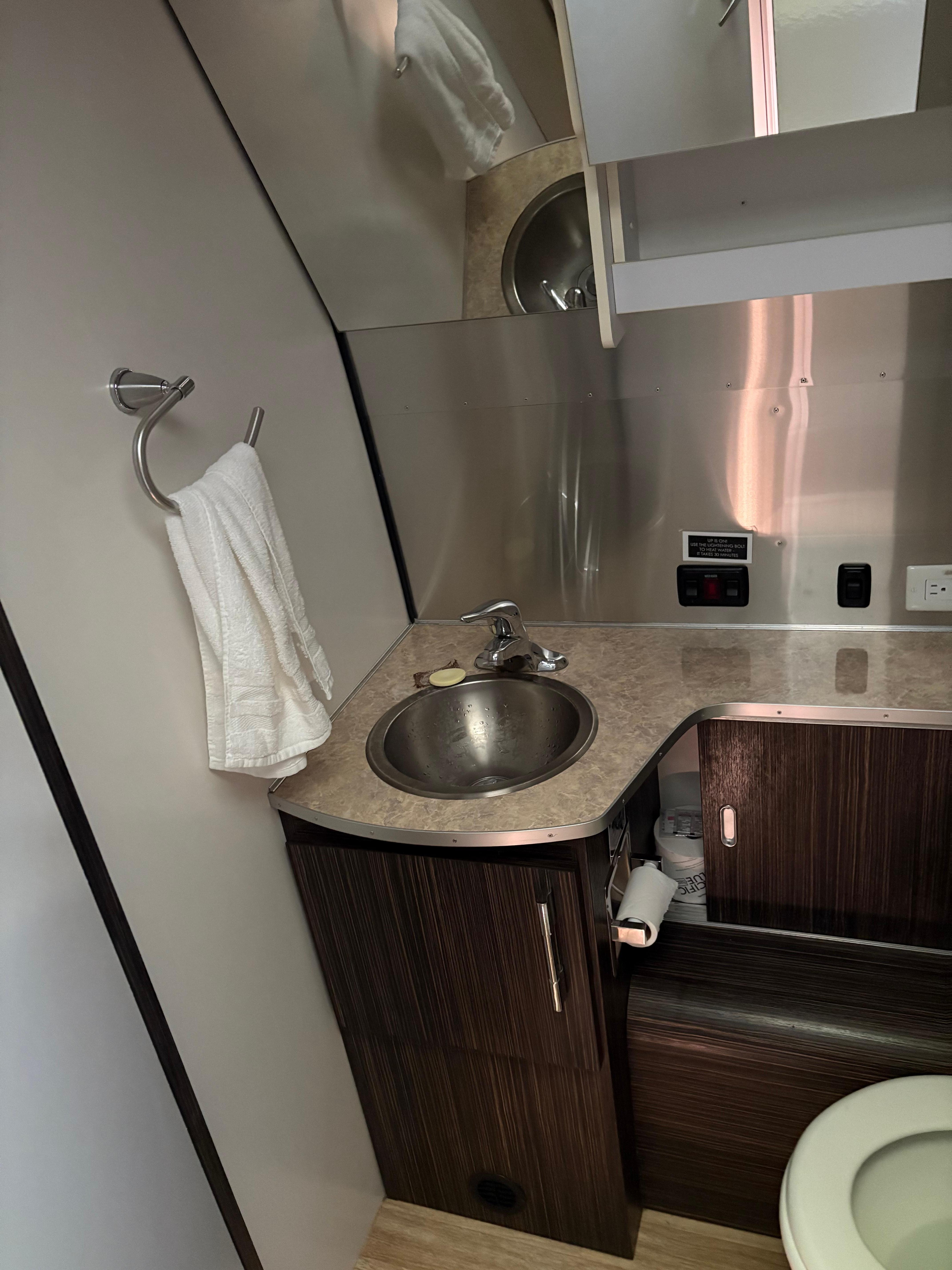 The toilet is also very tight.  The shared one is better for most business. 