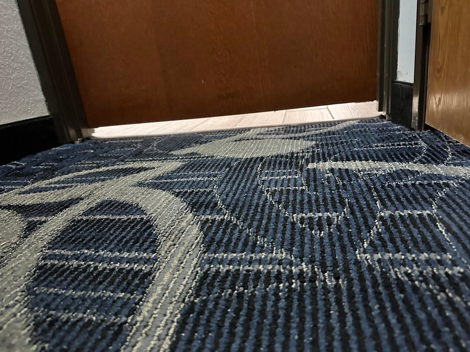How far the door is off the floor and amount of light from the hall coming in