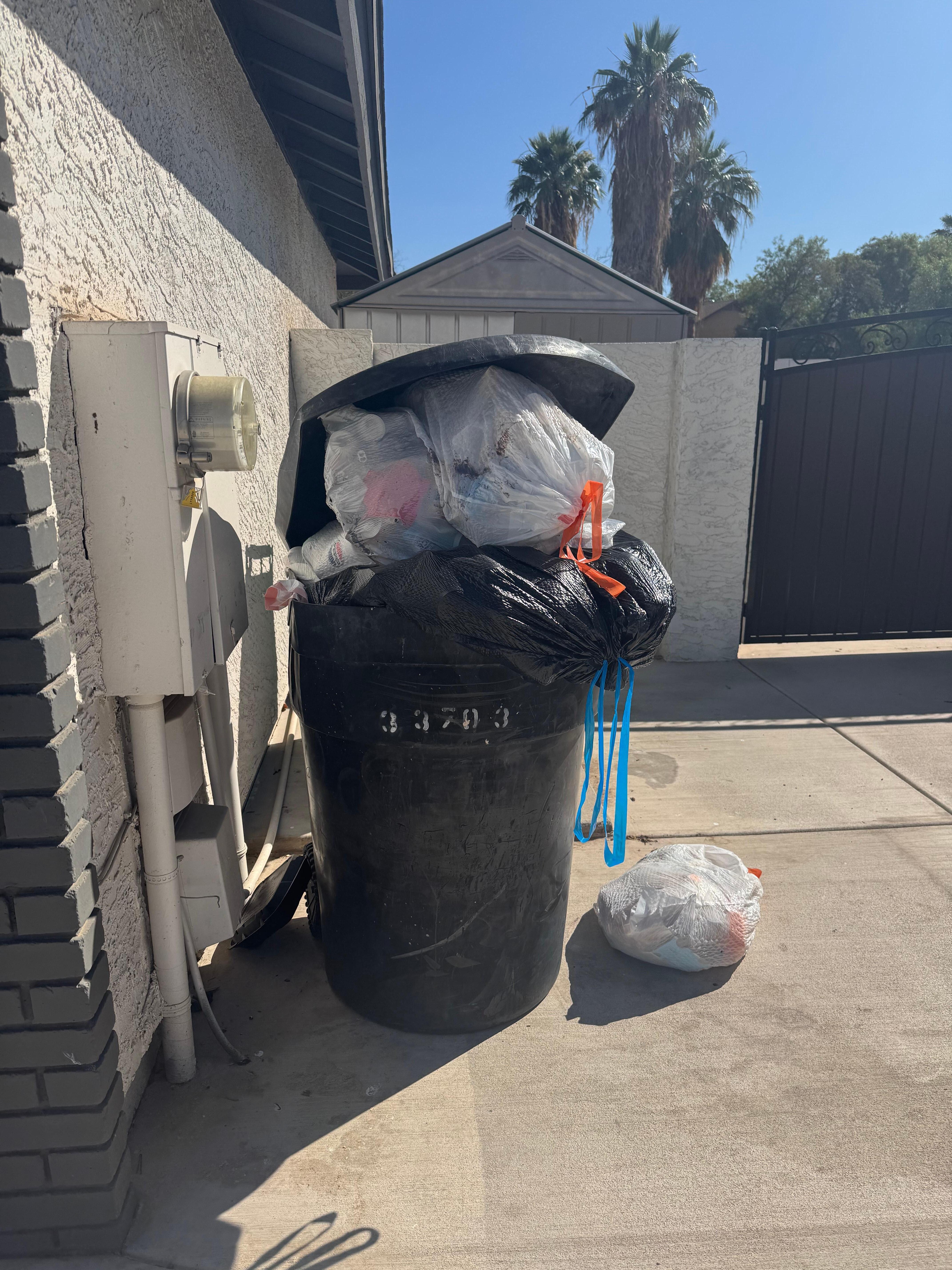 Overflowing trashcan upon arrival and never emptied.