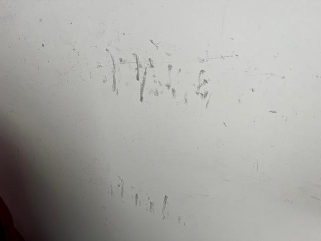 Marks on walls in room 204