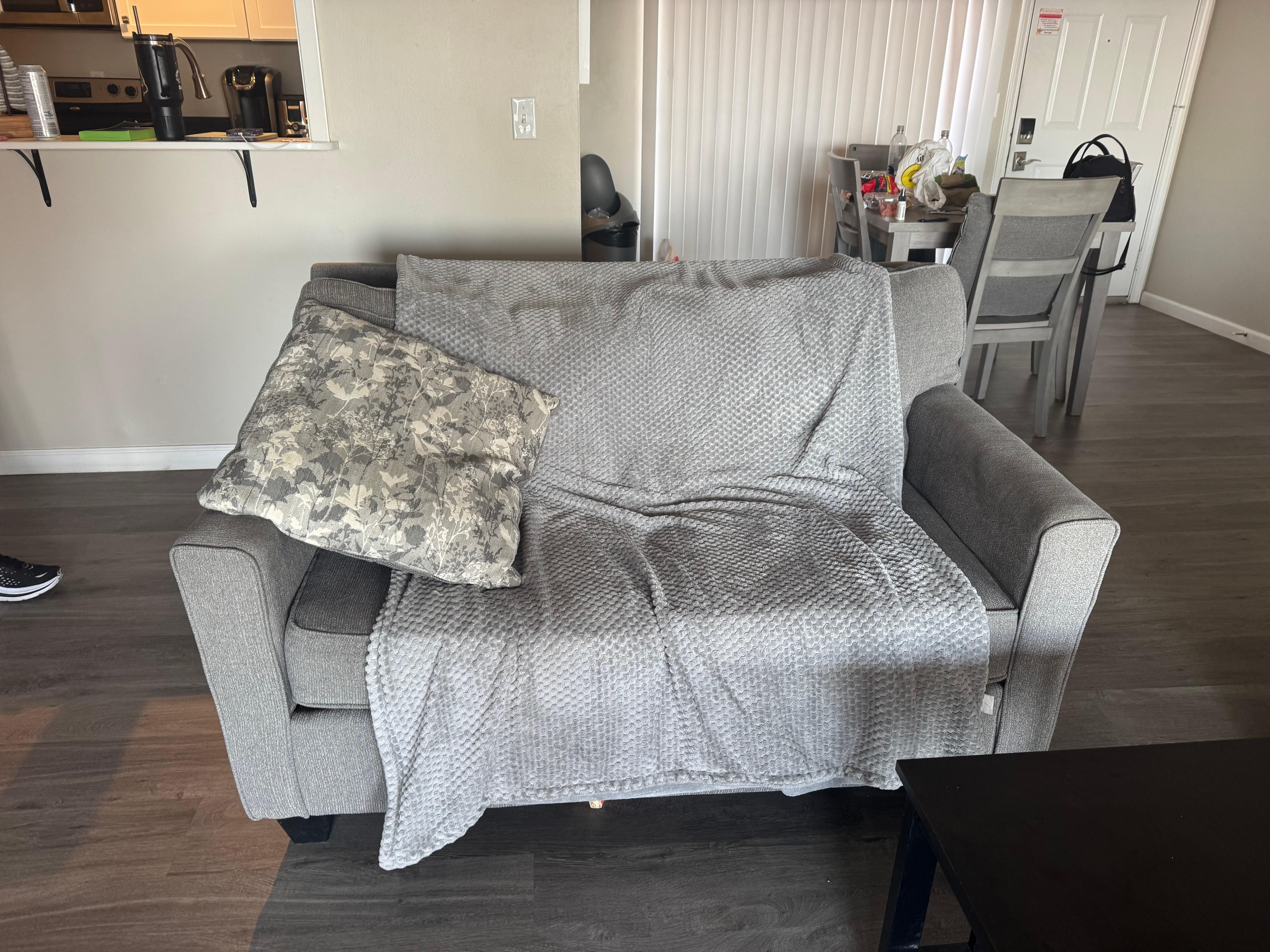 Blanket over love seat