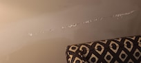 damage on wall from chair
