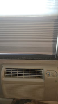 Loud rumbling AC unit