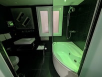 The bathroom - the colour changing lights can be switched off, but are nice while soaking in the bath