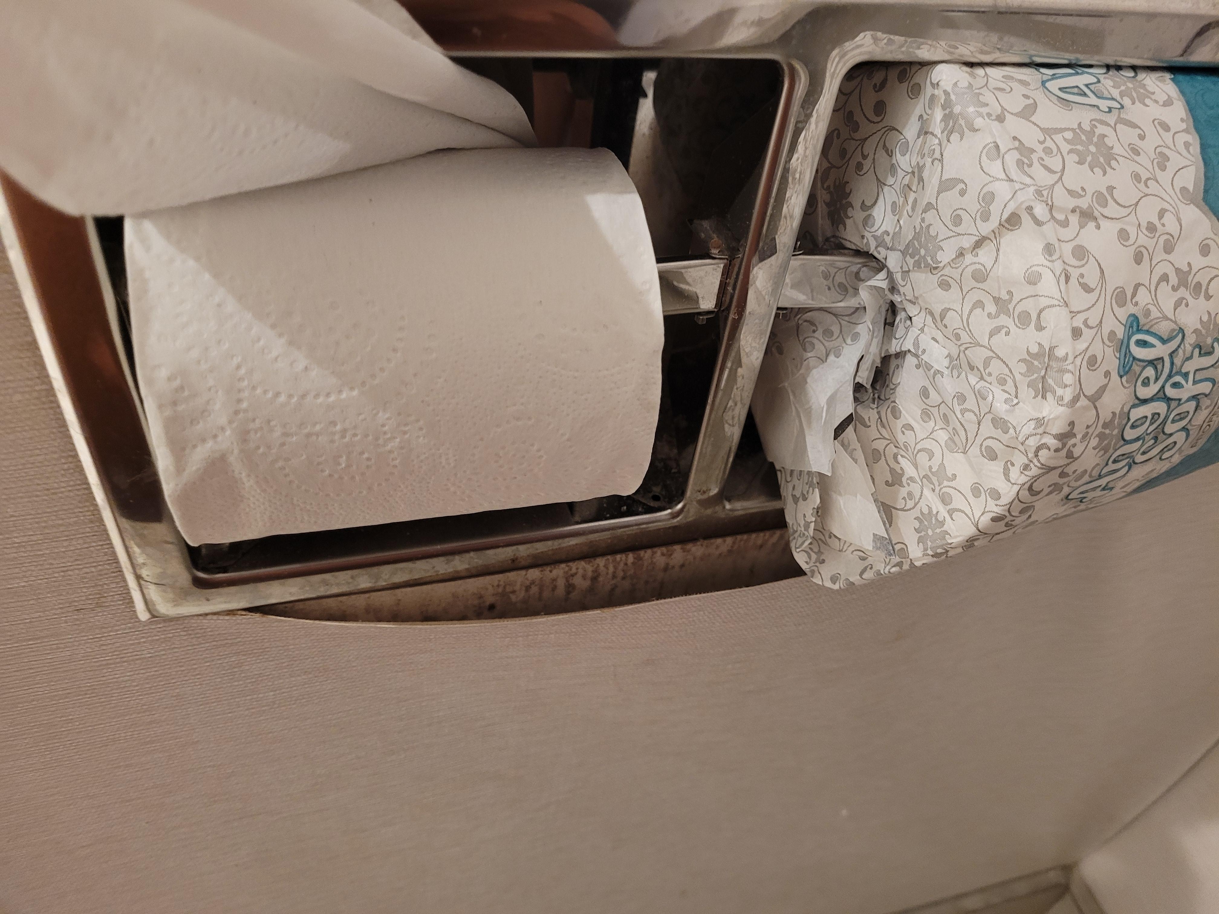 Wallpaper coming up and tissue holders don't work, also covered in dust