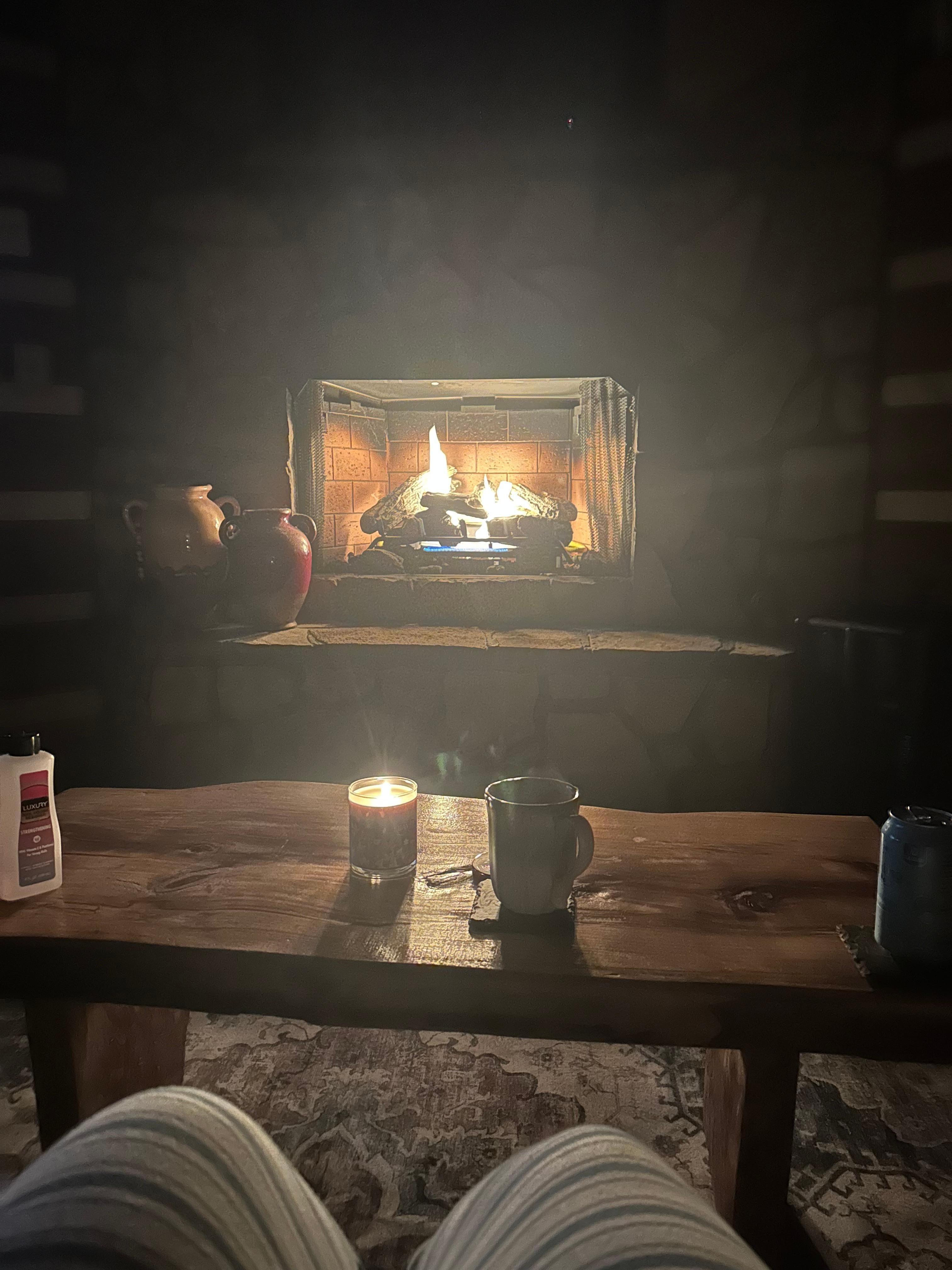 Early morning coffee by the indoor fireplace
