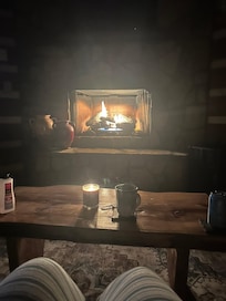 Early morning coffee by the indoor fireplace