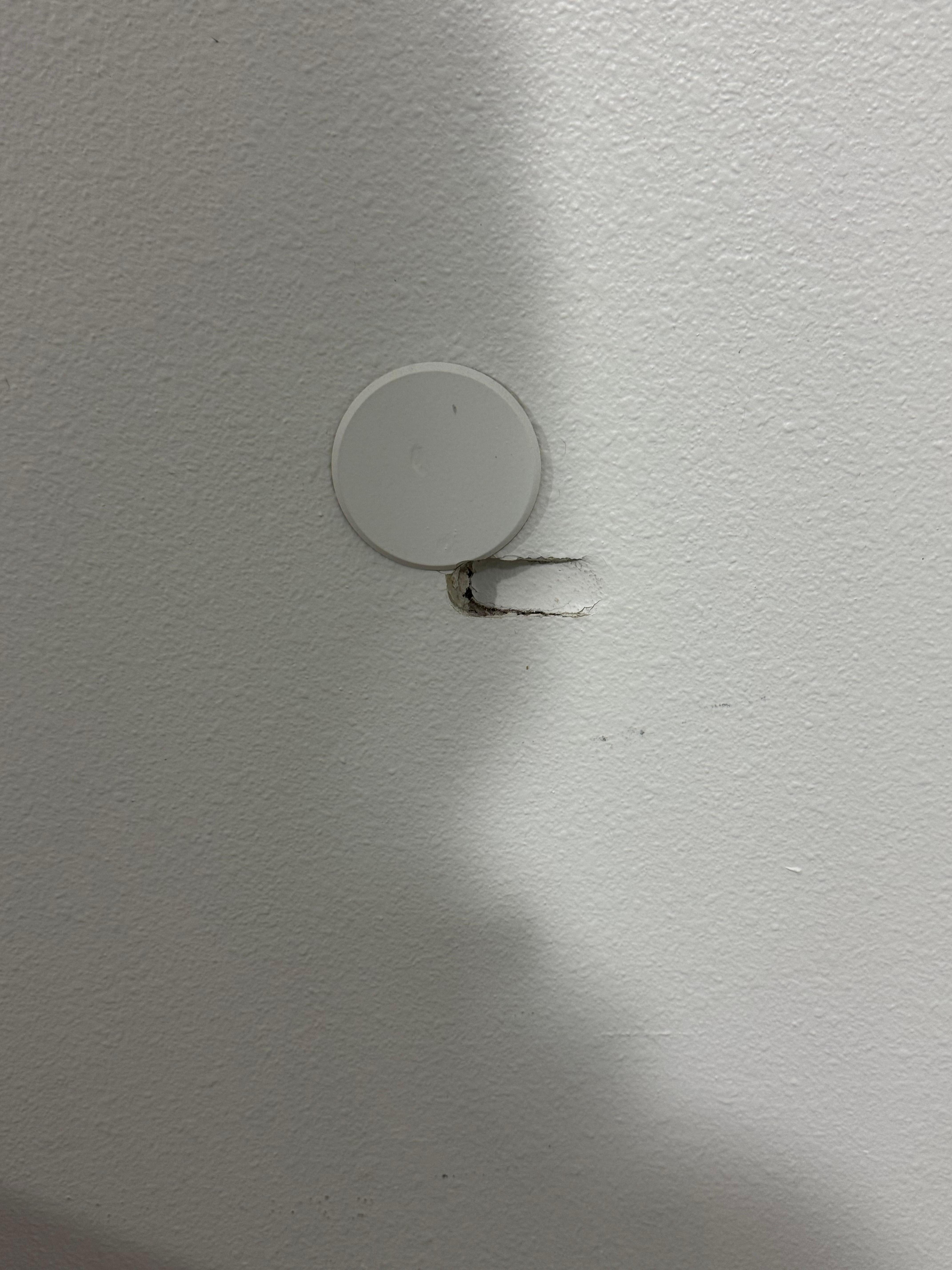 Hole where the door had been slammed open I was not planning on leaving a review until I got the email prompt or I would have pics of the other stuff. Took this so I had proof I did not cause the damage. 