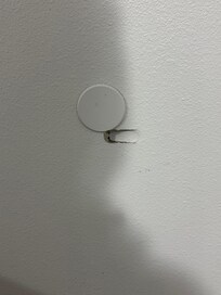 Hole where the door had been slammed open I was not planning on leaving a review until I got the email prompt or I would have pics of the other stuff. Took this so I had proof I did not cause the damage.