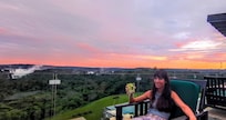 Sunsets on the rooftop bar with excellent specialty drinks!