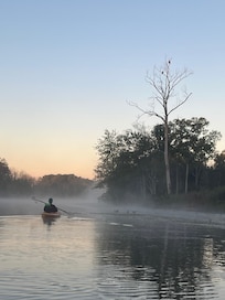 Kayaking near the house in the early morning