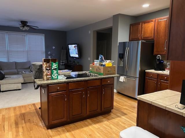 Kitchen view to family room. Leftover food going to my daughter.