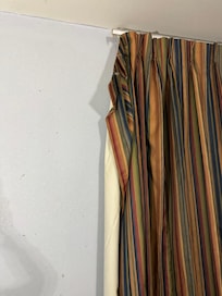 Curtains were torn off the rod