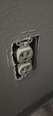 No cover next to the bed.
