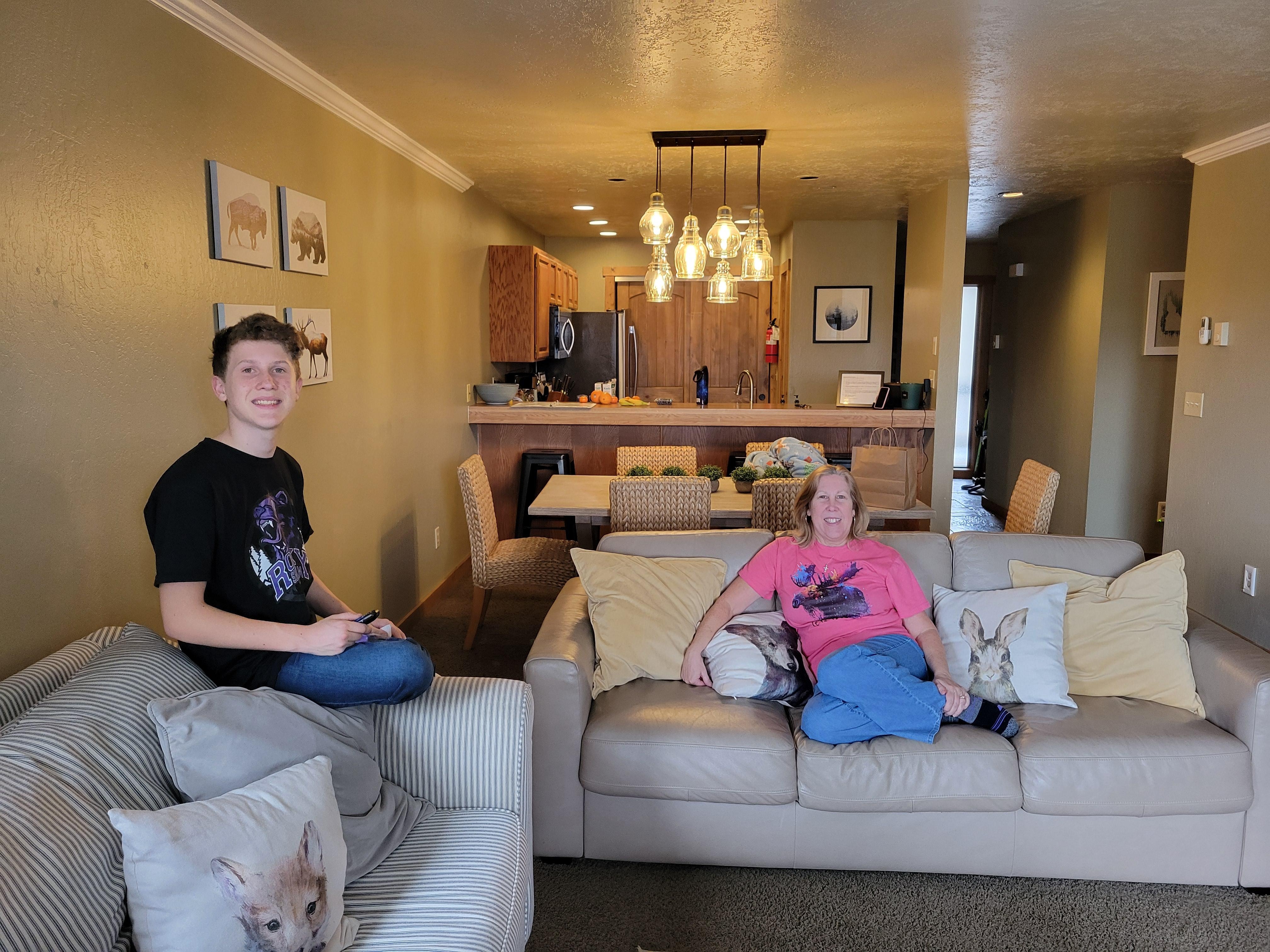Family relaxing time in the living room, getting ready to play board games!