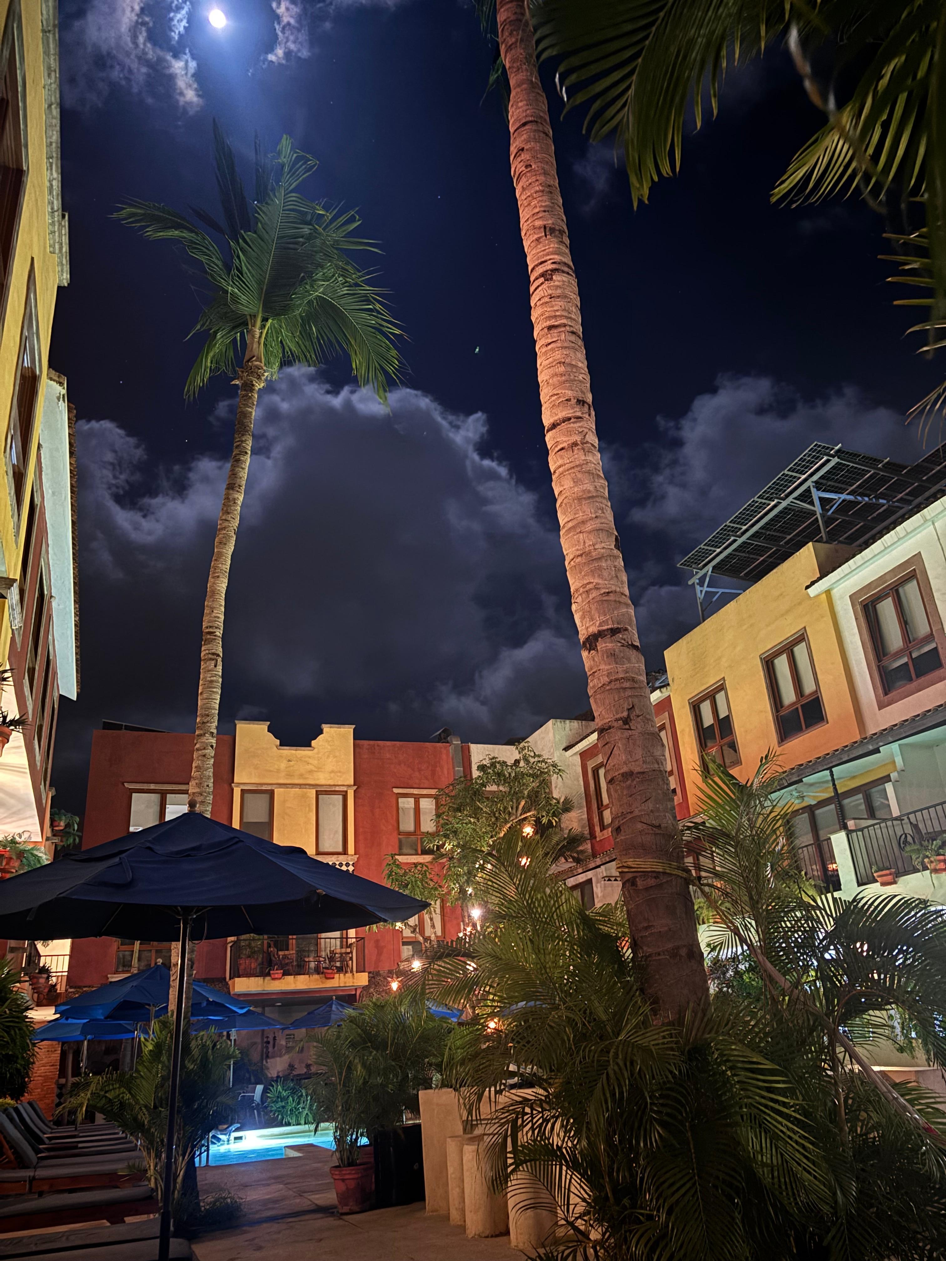 Relaxing outside our room near the pool