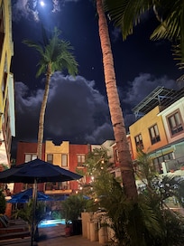 Relaxing outside our room near the pool