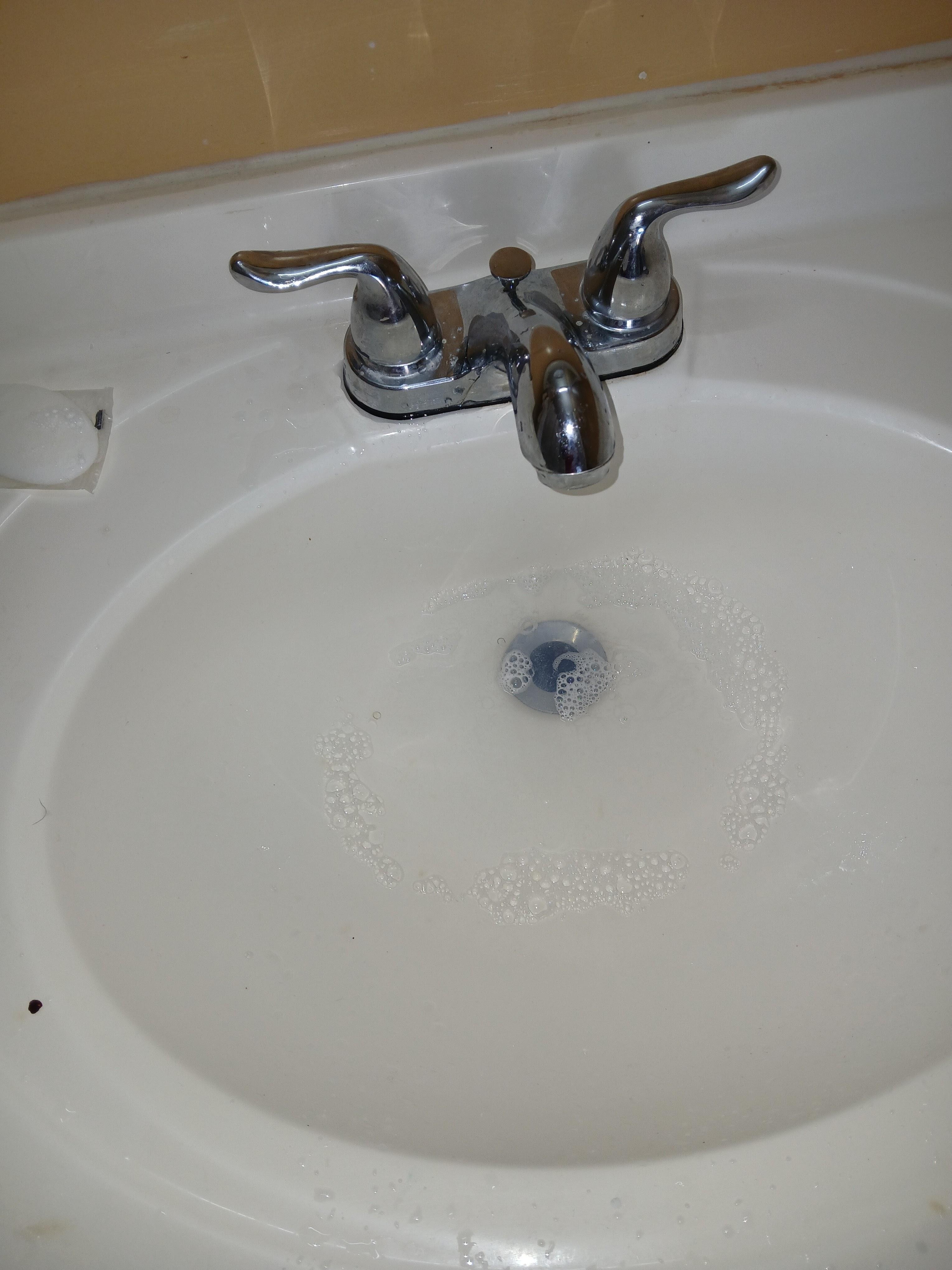 Sink has a slow draining system 