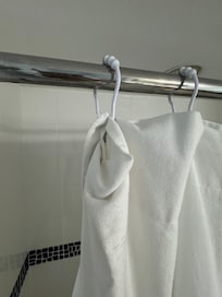 Shower curtain needs to be fixed