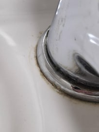 Dirty taps obviously not been cleaned for a while for this level of grime.