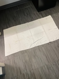 Towel on the floor for “leaks” of the room they gave me