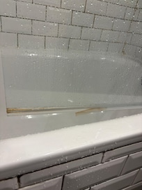 Molded and falling off safety guards on the shower.